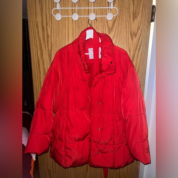 Red puffer jacket with a belt, snaps, and a high collar. The jacket is quilted. - Picture 3 of 4